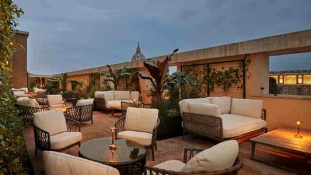 Bvlgari Bar rooftop lounge with modular seating for VIP networking and evening events.