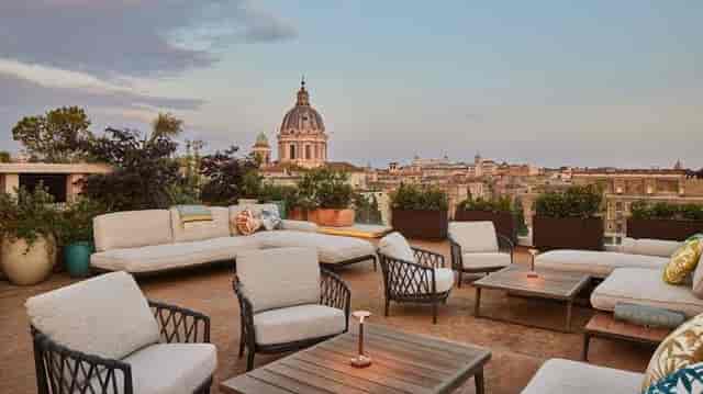 Bvlgari Hotel Rome boardroom with city skyline view for VIP cocktail receptions and networking.