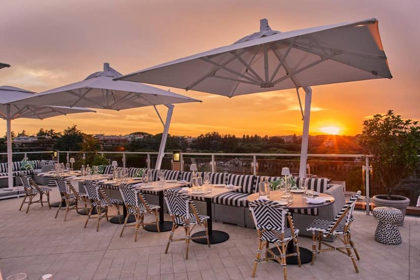 Rooftop cocktail reception at Ristorante AcquaViva, Hotel Villa Pamphili for corporate networking.