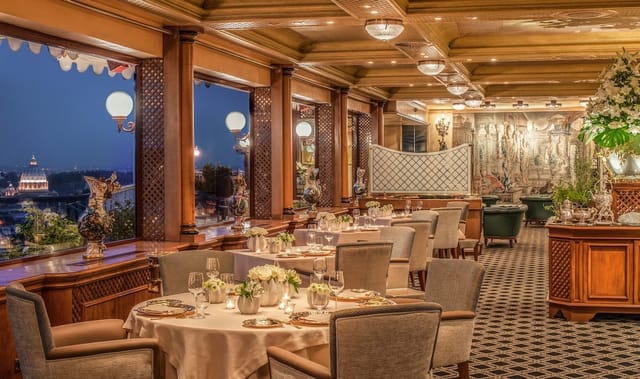 Tiepolo Bar banquet hall with Roman skyline view for corporate dinners and VIP receptions.