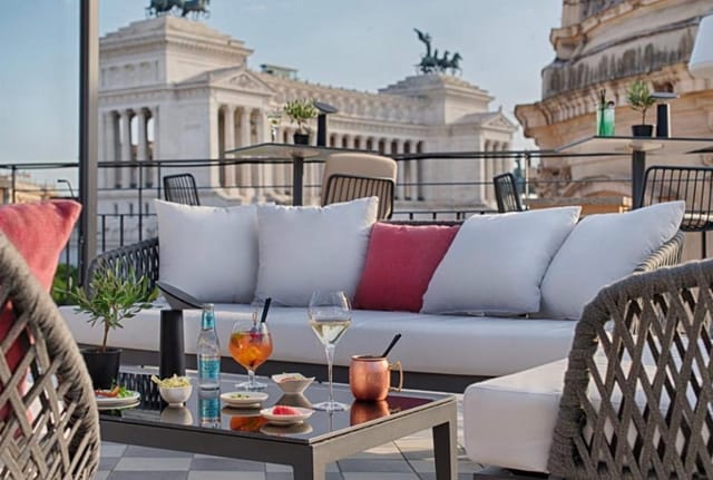 Luxury rooftop lounge in Rome for corporate cocktail receptions and networking events.