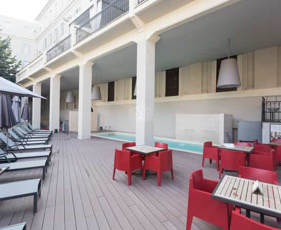 Gourmand’s Restaurant terrace with lap pool for networking receptions and cocktail events.