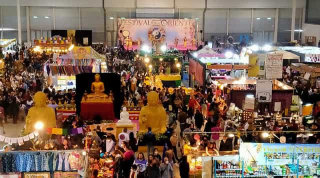 Trade show floor at Fiera di Roma featuring high-traffic experiential zones and event exhibits.