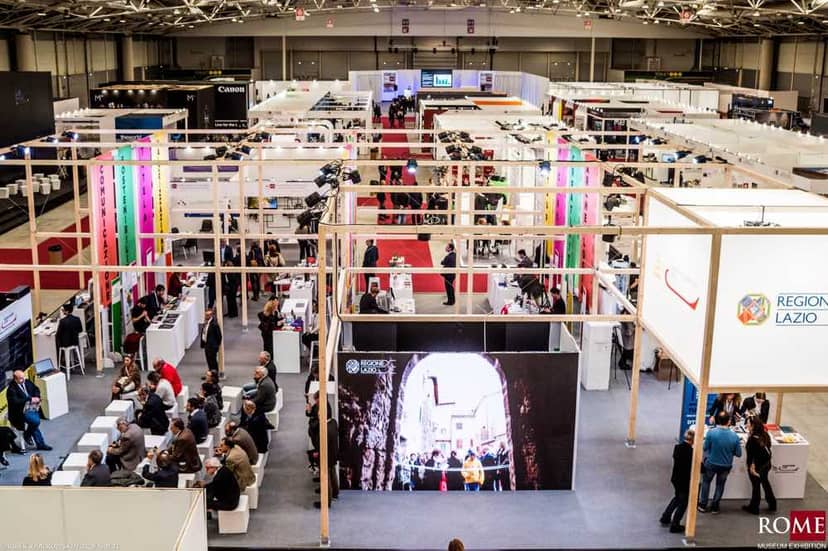 Modern trade show floor with modular stands at Fiera Roma exhibition venue for corporate events.
