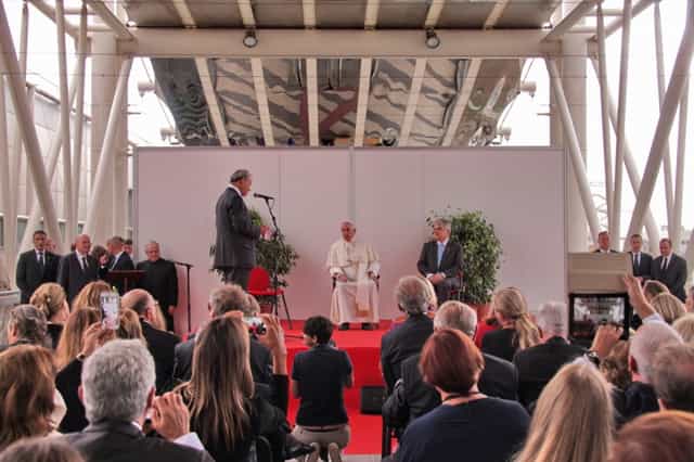 Fiera Roma keynote stage with tiered staging and greenery for professional corporate events.