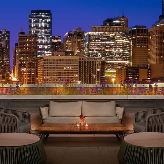 Rooftop networking lounge at Nobu Hotel, an intimate VIP event space with panoramic views.