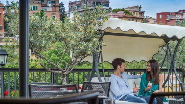Rooftop garden terrace at Trilussa Palace Hotel for executive retreats and incentive travel.