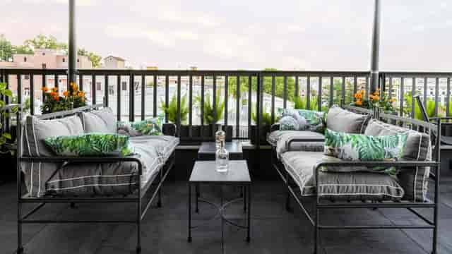 VIP rooftop cocktail lounge at Trilussa Palace Hotel with panoramic city views for networking.