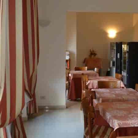 Guest lounge at Hotel Major Aventinus with dated decor for corporate events and professional meetings.