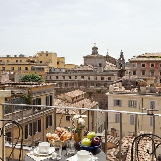 Rooftop venue at Hotel Prati Rome for exclusive cocktail receptions and executive dinners.