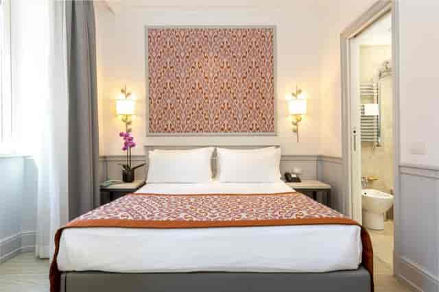 Hotel Della Conciliazione suite for business travel and conference accommodation.