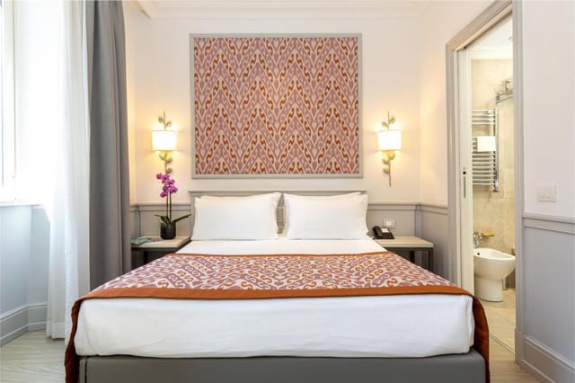 Hotel Della Conciliazione suite for business travel and conference accommodation.