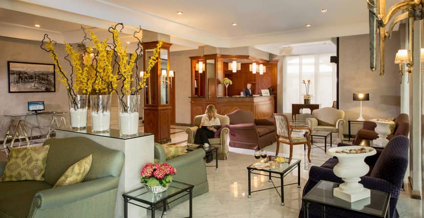 Hotel Santa Costanza lounge with plush seating for B2B networking and corporate events.