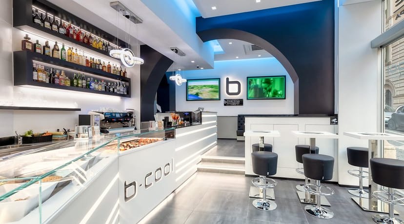 Modern hotel bistro with sleek bar for networking events and corporate receptions.