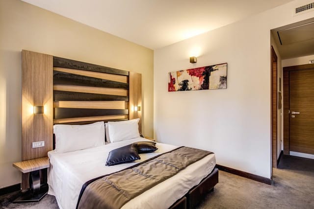 Modern hotel suite with minimalist design for business conferences and corporate events.
