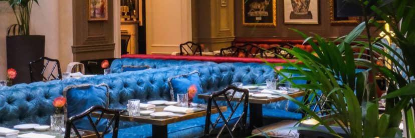 Blue velvet banquette restaurant in Maalot Roma for VIP dinner and corporate events.