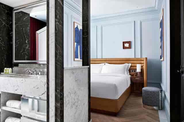 Luxury hotel suite at W Rome for VIP speaker accommodation and executive business travel.