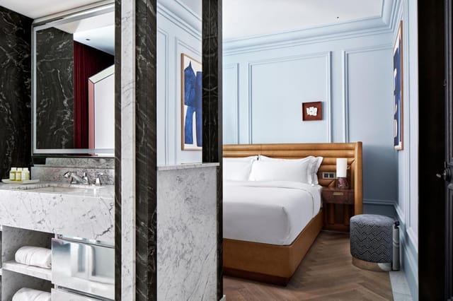 Luxury hotel suite at W Rome for VIP speaker accommodation and executive business travel.