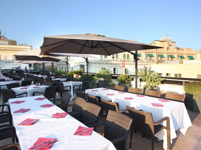 Rooftop bar venue at The Hive with formal dining tables for corporate networking events.