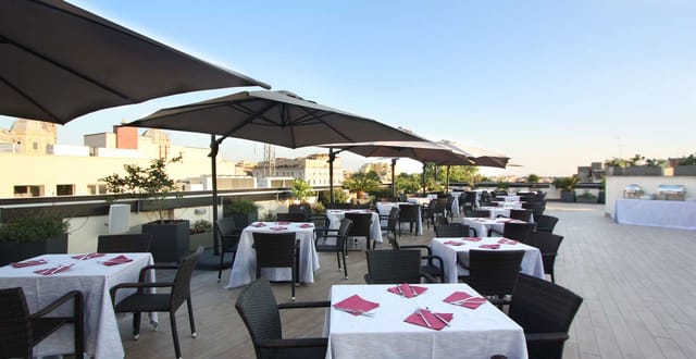 Rooftop meeting room with umbrellas for cocktail receptions and banquet event rentals.