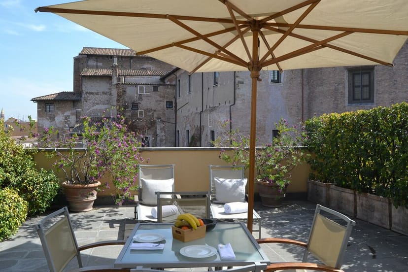 Rooftop terrace overlooking Colosseum: VIP meeting space and luxury incentive retreat venue.