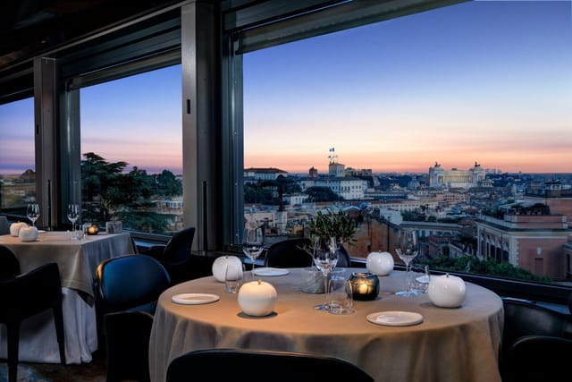 Elegant Hotel Eden piano bar with sunset views, ideal for executive dinners and VIP receptions.