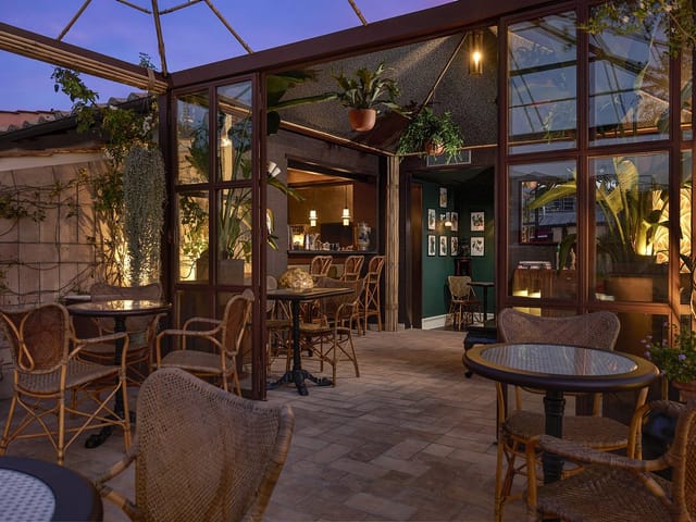 Bistro at Hotel Parrasio: biophilic breakout space for conference networking and corporate events.