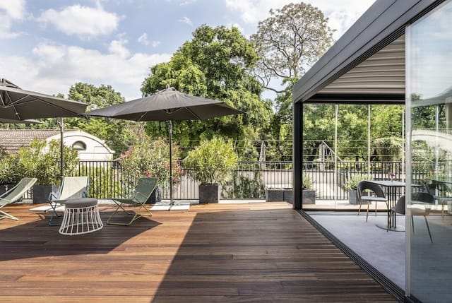 Horti 14 rooftop terrace: versatile breakout space for executive sessions and networking events.