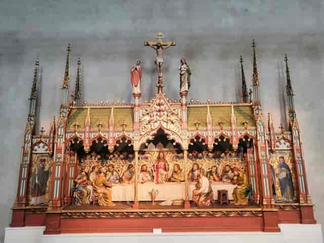 Swedish History Museum auditorium with ornate stage backdrop for conference and event rental.