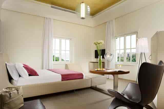 Palazzo Montemartini business suite with workspace for luxury corporate travel and VIP events.