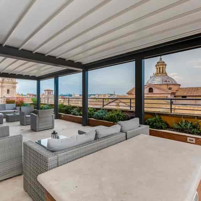 VIP rooftop terrace in Rome with city skyline view for premium networking events.