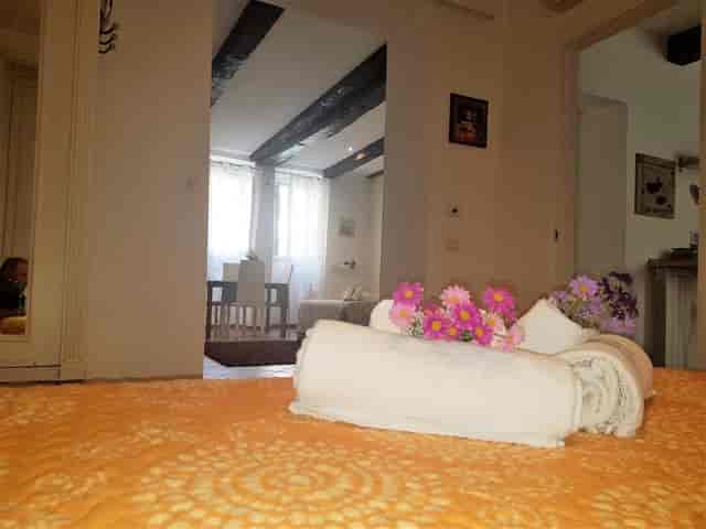 Boutique L'Apartmento suite with rustic architecture, perfect for executive retreats and travel.