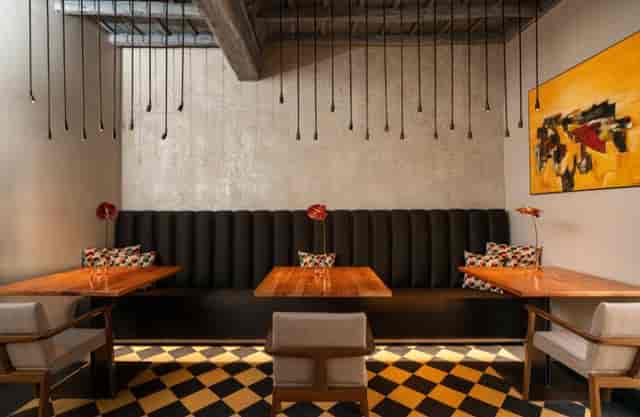 Boutique VIP dinner space at Ristorante il Pagliaccio with intimate banquette seating for events.