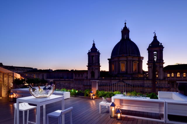 Luxury rooftop wine bar in Rome, ideal for high-end corporate events and incentive travel.