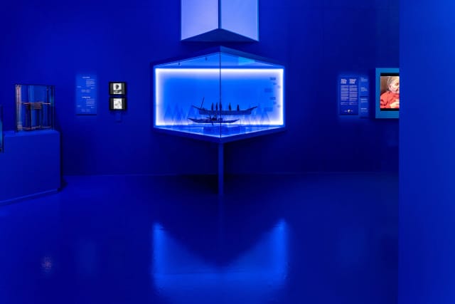 Arctic exhibition at Nordiska museet with bold monochromatic lighting for museum event design.