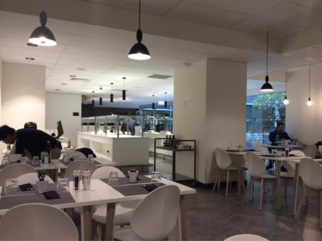 Antonello Colonna modern restaurant space with modular seating for corporate networking events.