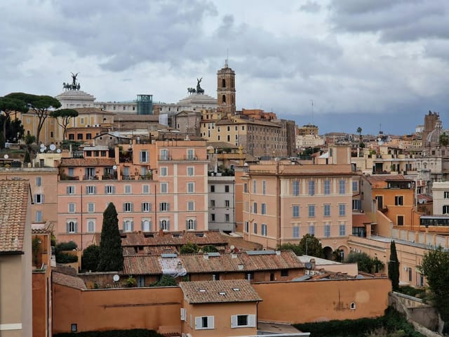 Rhinoceros Rooftop bar: Scenic Rome skyline view for executive retreats and networking events.