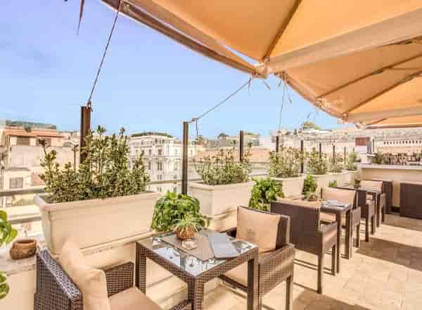 Rooftop hotel restaurant venue for networking events and private meetings.