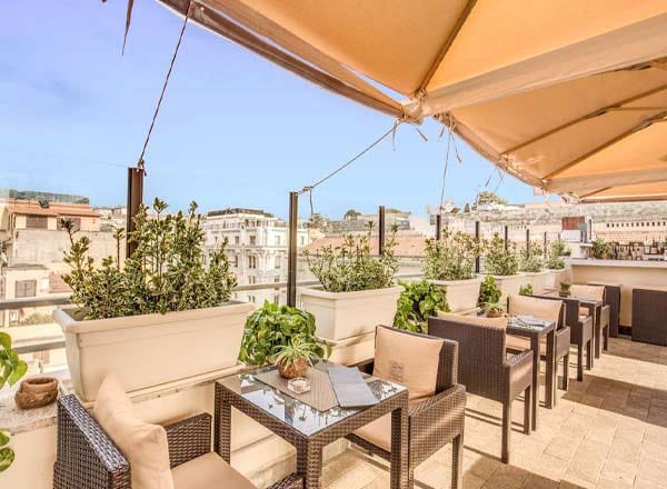 Rooftop hotel restaurant venue for networking events and private meetings.