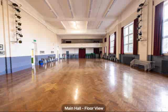 Main Hall at The Brixton: Versatile herringbone event venue for conferences and banquet dinners.