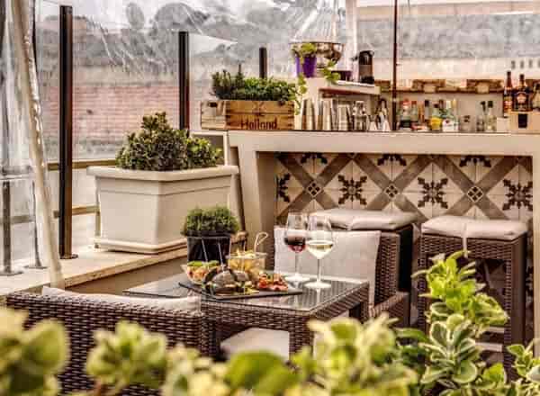 VIP rooftop lounge with sleek seating for networking events and upscale cocktail receptions.
