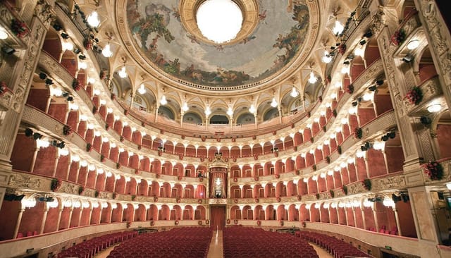 Teatro Costanzi tiered auditorium for prestigious keynote addresses and awards gala events.