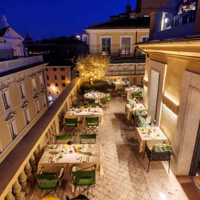 Rooftop event space at Singer Palace Hotel featuring warm ambient lighting for premium evening gala.
