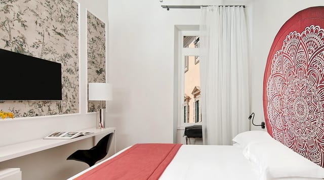 Boutique hotel room at Centrale Palace, stylish guest accommodation for business travel.