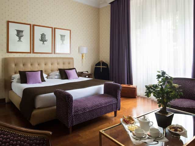 VIP hotel suite in Sala Borghese with premium bedding for incentive travel and luxury events.