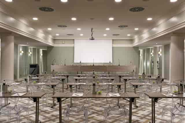 Modern classroom setup for corporate training seminar with ghost chairs at Leon's Place.