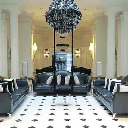 Luxury hotel lobby at Leon's Place for VIP arrivals and executive networking events.