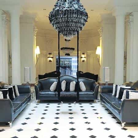 Luxury hotel lobby at Leon's Place for VIP arrivals and executive networking events.
