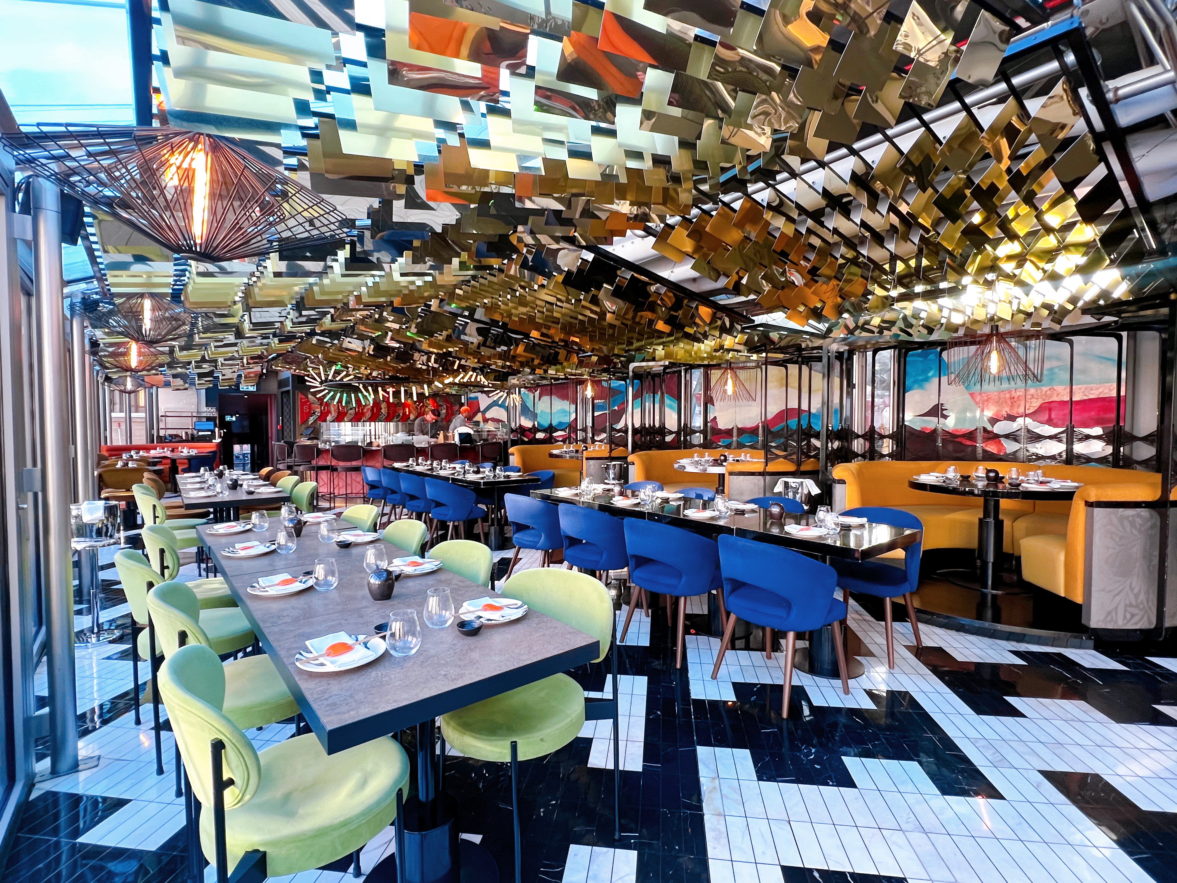 Vibrant SUSHISAMBA Covent Garden restaurant ideal for group events, featuring colorful seating. - Banner