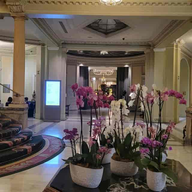 Circulo Palace pre-function area with floral decor for luxury event registration and hosting.
